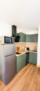 Appartements Sous le tilleul : photos des chambres