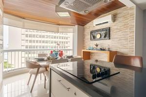 Flat ao lado do Mar Four Season