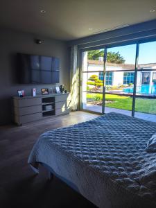 Villas ღ Villa des Astres 850 m2 - Piscine, Jacuzzi, Sauna, Hammam, & Salle de Cinema : photos des chambres