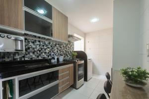 Alto padrão a poucos passos da Praia Grande