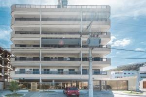 Alto padrão a poucos passos da Praia Grande