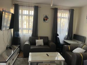 Sahel Executive Studio apartment with separate kitchen and bathroom in another section from the main room for cheap accommodation in Elgon View near Eldoret sports club,Rapha Hospital, Naivas supermarket, rupha mall, and Eldoret International Airport