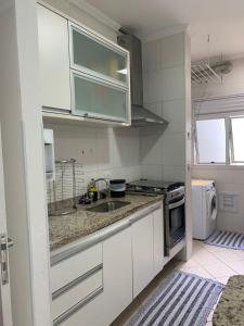 Confortável apartamento próximo a praia em Riviera de São Lourenço