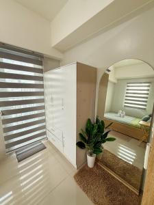 Spacious 1BR Unit with Balcony Grass Residences Tower 5 beside SM North