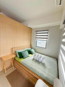 Spacious 1BR Unit with Balcony Grass Residences Tower 5 beside SM North