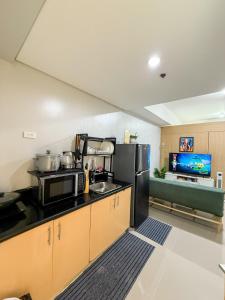 Spacious 1BR Unit with Balcony Grass Residences Tower 5 beside SM North