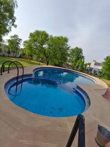 4 BHK Villa with Plunge Pool & Glasshouse Manihar Farms I Managed By Vicinity