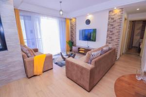 luxurious fully furnished two bedroom apartment with heated swimming fully equipped gym ample parking space children playing ground and a relaxing rooftop with amazing city views