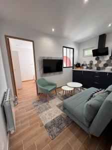 Maisons de vacances Logement cosy avec terrasse : photos des chambres