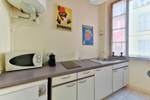 LE RÉTRO studio avec mezzanine en plein centre