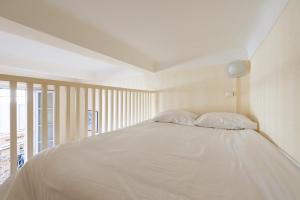 LE RÉTRO studio avec mezzanine en plein centre