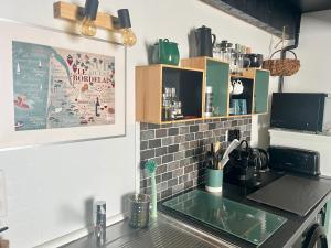 Appartements La SUITE des AUGUSTINS : photos des chambres
