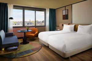 Standard Room with Canal View with Extra Bed (2 Adults + 1 Child) room in NH Amsterdam Museum Quarter