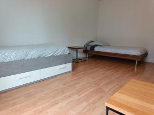 Appartements Les trois Frontieres : photos des chambres