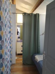 Maisons de vacances Le jardin secret : photos des chambres