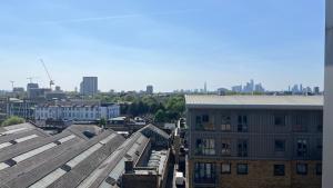 Sunset Heights Bright 2BR with City Views and Free Parking