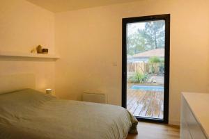 Villas Modern house with pool, between lake and forest : photos des chambres