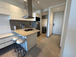 Hermosa y Comoda Suite en Distrito 90