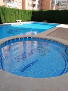 Bonita piscina y playa de gandia