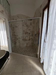 Standard Quadruple Room with Lateral Sea View room in Relais La Pretura
