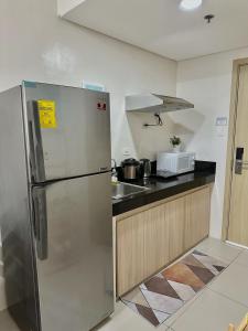 Vine Residences 2BR, Unli WiFi, PrimeVideo, freeparking Near Mall, Kiddie Pool 902