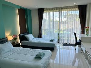 The serene Panwa beach front pixels