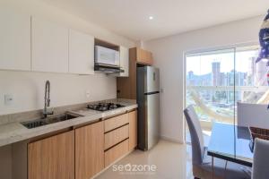 Apto 2Q c Churrasq. e vista 550m da Praia OMC1303