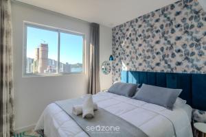 Apto 2Q c Churrasq. e vista 550m da Praia OMC1303