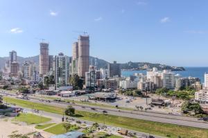 Apto 2Q c Churrasq. e vista 550m da Praia OMC1303