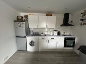 Bright bedroom with king side bed and shared bathroom or whole one bedroom apartment