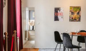 Appartements Olympia - Terrasse, Parking gratuit, Theme Cinema, Coeur de ville, Rez de chaussee, Fibre, Tv 4K : photos des chambres