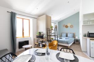 Appartements L'Isle en Blanc - 4 couchages - Hypercentre - Clim - Wifi : photos des chambres