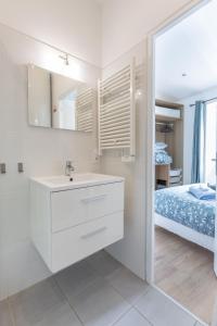 Appartements L'Isle en Blanc - 4 couchages - Hypercentre - Clim - Wifi : photos des chambres
