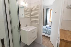 Appartements L'Isle en Blanc - 4 couchages - Hypercentre - Clim - Wifi : photos des chambres