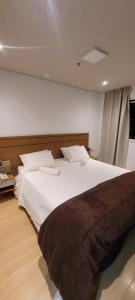 São Paulo Flat Familia ExtraComfort TV 65" lado Sírio Libanes