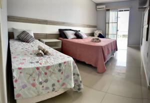 Casa 2 Suítes+1 - VISTA MAR e 15km do Beto Carrero - 50 metros da PRAIA - Area de LAZER com Churrasqueira - Wi-Fi e Cozinha Completa