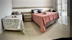 Casa 2 Suítes+1 - VISTA MAR e 15km do Beto Carrero - 50 metros da PRAIA - Area de LAZER com Churrasqueira - Wi-Fi e Cozinha Completa