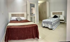 Casa 2 Suítes+1 - VISTA MAR e 15km do Beto Carrero - 50 metros da PRAIA - Area de LAZER com Churrasqueira - Wi-Fi e Cozinha Completa