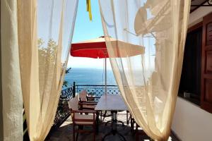 The Pagasetic Balcony - Magestic Sea Cottage