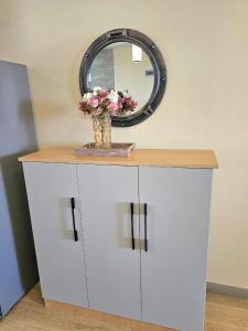 luxurious two bedroom apartment with well equipped gym,heated swimming pool, ample parking space and a relaxing rooftop with amazing city views