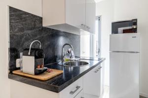 LE LOUIS BLANC avec balcon en plein centre-ville