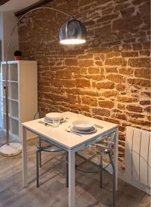 Appartements L Adresse Carnot - HYPERCENTRE - GARE - PARKING - HISTORIQUE : photos des chambres