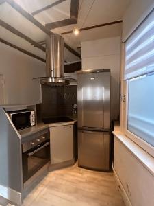 Appartements L Adresse Carnot - HYPERCENTRE - GARE - PARKING - HISTORIQUE : photos des chambres