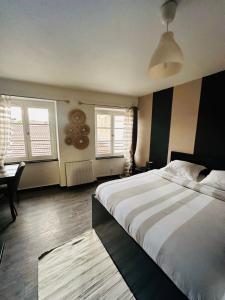 Appartements L Adresse Carnot - HYPERCENTRE - GARE - PARKING - HISTORIQUE : photos des chambres