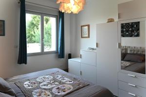 Maisons de vacances La Villa Palmier - Piscine avec Grand Jardin : photos des chambres