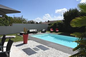 Maisons de vacances La Villa Palmier - Piscine avec Grand Jardin : photos des chambres
