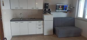 Kuća Domina Dučac, Postira