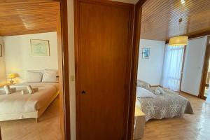 Chalets Beautiful detached house facing the slopes : photos des chambres