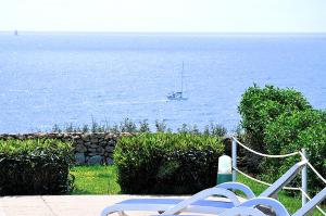 VILLA HELIOS Villa en Cala Pi con vistas despejadas