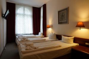 Triple Room room in Hotel Pension Xantener Eck